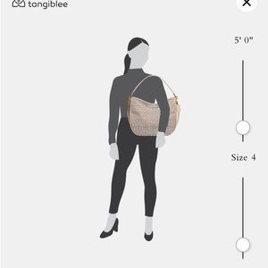 A hobo silhouette in signature monogram jacquard with smooth leather trim.